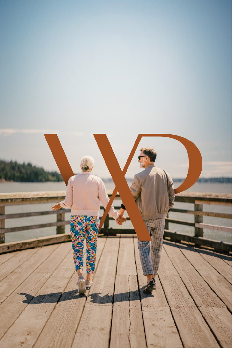 Couple walking on a pier